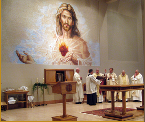 A large painting of jesus with people in the background.